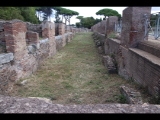 00654 ostia - regio ii - decumanus maximus - regio ii - insula ii - portico del tetto spiovente (ii,ii,6) - laeden - ri osten -09-2022.jpg